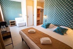 Hotels Hotel de la Mer : photos des chambres