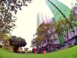 Family Suite Connecting 4 Bedroom at Apartment Green Pramuka City