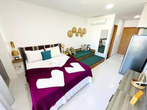 Flat Malia D304 com Atmosfera de Praia - Muro Alto - By Anfitrião Legal