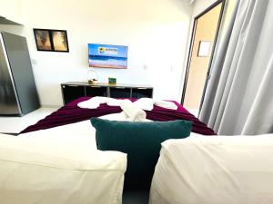 Flat Malia D304 com Atmosfera de Praia - Muro Alto - By Anfitrião Legal