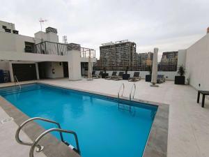 HOM l Parking Cowork Urbano Piscina Parque Almagro