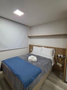 Apto novo com Ar Condicionado bem localizado