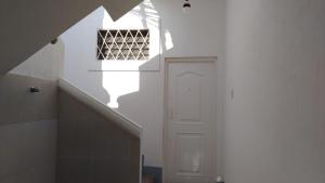 Liza, habitación privada de Flor de Lis Beach House