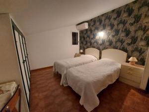Villas Villa climatisee avec belle terrasse et jardin a Saint-Genis-des-Fontaines - FR-1-776-133 : photos des chambres