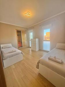 Modern flat and private attic close to beach
