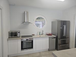 Villas Villa ILO - devant la plage des Nonnes : photos des chambres
