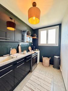 Appartements La Pilate, avec vue sur les toits de Rennes : photos des chambres