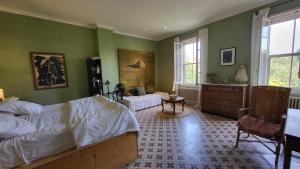 Villas Comme a la campagne en plein coeur de village : photos des chambres