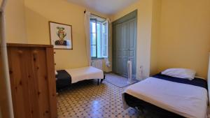 Villas Comme a la campagne en plein coeur de village : photos des chambres