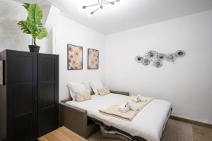 Appartements Studio a 2 min metro 13 - acces Paris Champs-Elysees : photos des chambres