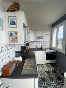 Appartements Entre terre & Mer : photos des chambres