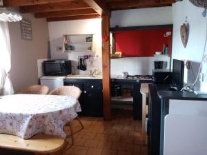 Appartements Le Grimpeur : photos des chambres