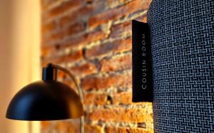 Cousin Room Hotel Automatizado