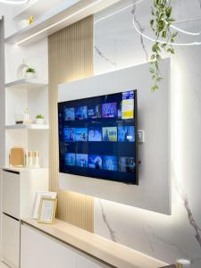 Eastovia Suites city center condo with pool at Fame