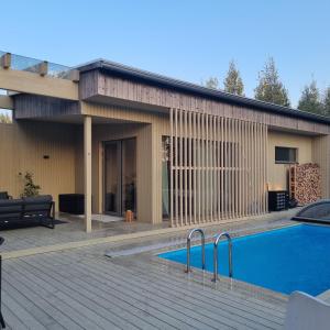 Viihtyisä vierasmaja saunalla