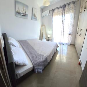 Odyssea Seaside Apartment with Sea View and Pool