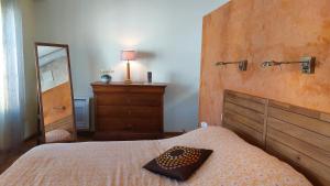 Appartements Le Petit DoMeynes : photos des chambres