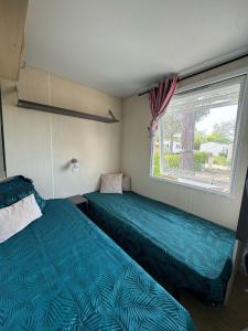 Campings Camping logement entier 3 chambres : photos des chambres