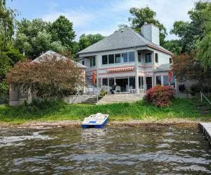 Risingwater Newly Listed Stunning Home with 150-Foot Beachfront in the Finger Lakes - Branchport