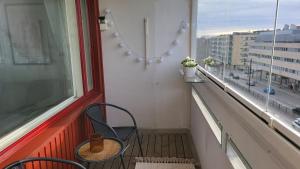 Direct train to Helsinki and airport, near shopping center