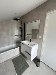 Appartements Oasis Balcon Vibes Tropicales Arena Parc Expo Clim : photos des chambres