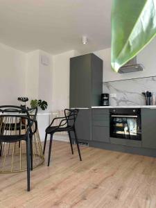 Appartements Studio cosy : photos des chambres