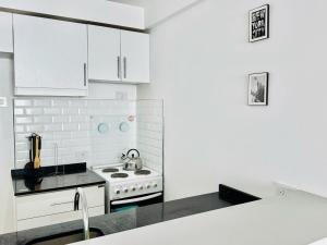 Estudio industrial con balcón