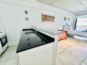 Estudio industrial con balcón