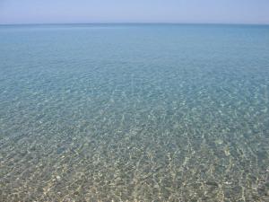 Right in front of the best beach-Seafront family house with garden