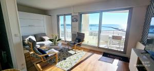 Appartements KerLorandeEvens, face mer, parking : photos des chambres