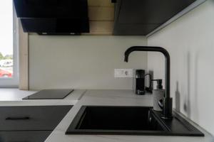 Tiny house aan het water op de appelhof