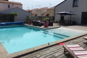 Maisons de vacances Maison loft piscine : photos des chambres