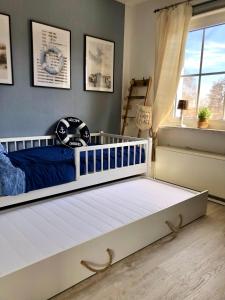 Sonniges Strandhaus mit Wasserblick am Haff mit 2 Schlafzimmern für 4 Pers