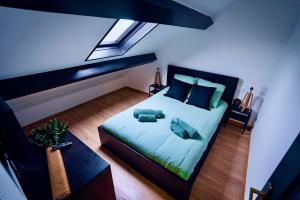 Appartements ValenStay - Duplex Stade du Hainaut avec terrasse : photos des chambres