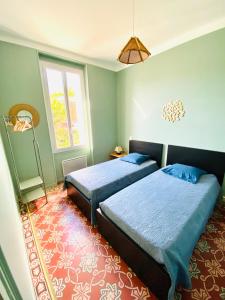 Appartements Soleil d-Or - Appartement curistes balcon - terrasse : photos des chambres