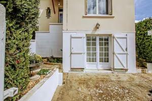 Maisons de vacances Le Temps de Vivre - Maison avec jardin proche Deauville : photos des chambres