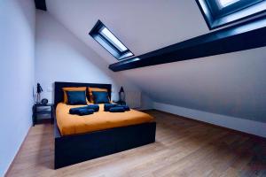 Appartements ValenStay - Duplex Stade du Hainaut avec terrasse : photos des chambres