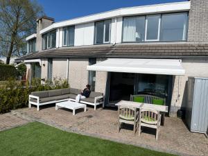 Lemmer House - Luxe familiehuis aan het water