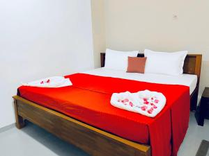 The Wave Rooms & Hostel