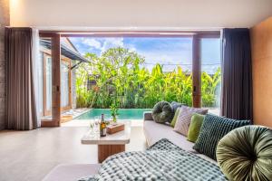 Soak in the Sun by the Pool at Solari Buddha Villa