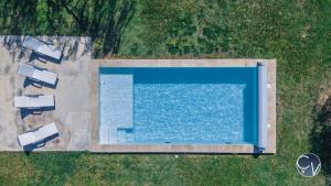 Villas Villa moderne avec piscine dans village calme : photos des chambres