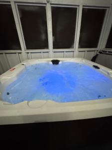 Fully updated home with hot tub in amenity filled community