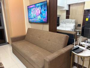 Cozy Studio near BGC Super Fast Wi-Fi