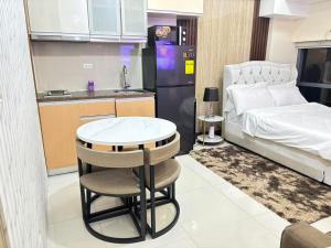 Cozy Studio near BGC Super Fast Wi-Fi