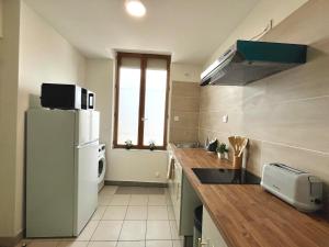Appartements Duplex renove a 15 min de Lyon : photos des chambres
