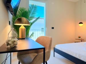 I Nidi di Dommos - Camere nel centro storico di Orosei