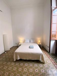 Small Double Room in Shared Colonial Guesthouse
