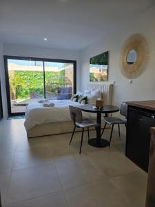 Appartements Oasis SpaLagon Chauffe climatise Arena parc expo : photos des chambres