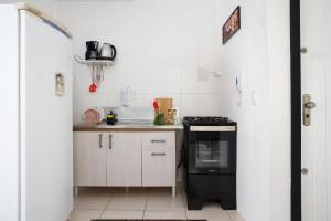 Loft kobrasol com garagem e ar condicionado