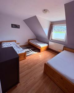 Apartmány u tenisového kurtu